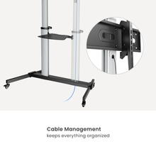 Cable management system with a stand and mounted TV, emphasizing organized cable management.
